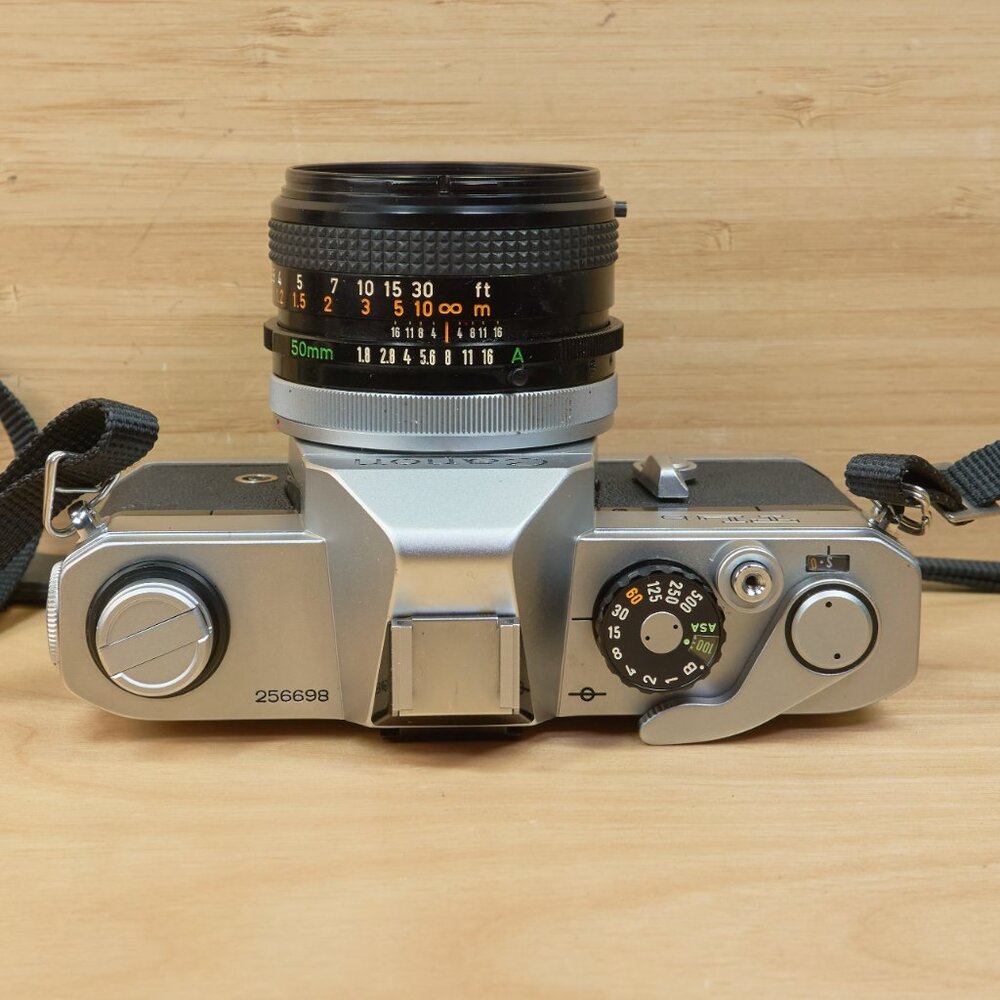 Canon silver and black SLR Film Camera with 50mm Lens - Picture 6 of 10